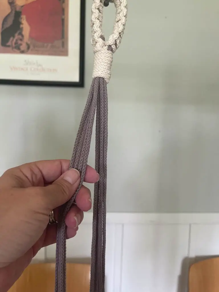separating strings to make the plant hanger arms